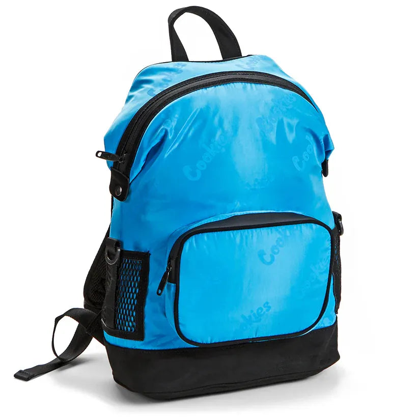 Bright blue satin backpack with all-over embossed "Cookies" logo, black trim, front zip pocket, and side mesh pockets.