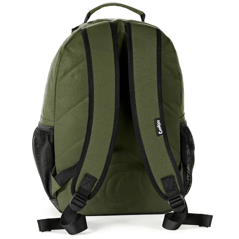 Olive green Stasher smell proof backpack with black trim, mesh side pockets, and a "Cookies" logo patch on the strap.